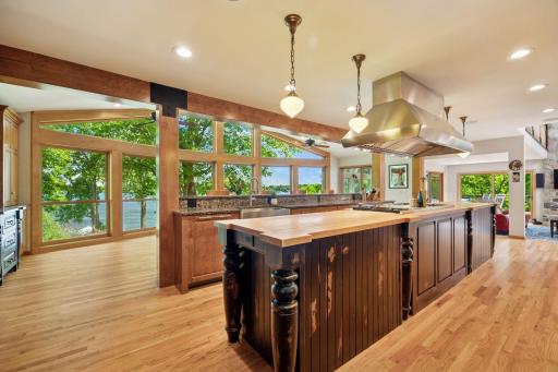 Chef Envy Summary: the kitchen domain is an unparalleled entertainment space integrated with super-premium appliances, both practical and aesthetic lighting options, multiple prep spaces, and the panoramic perspective of exterior and interior alike.