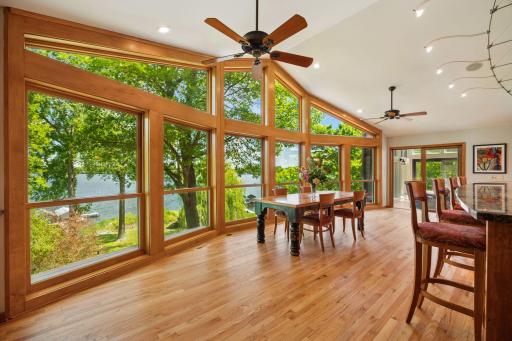 Who needs a big-screen TV? The custom-made table goes with the home and has extra leaves that can serve 16 if you must tear guests away from the nearby casual dining bar height counter.