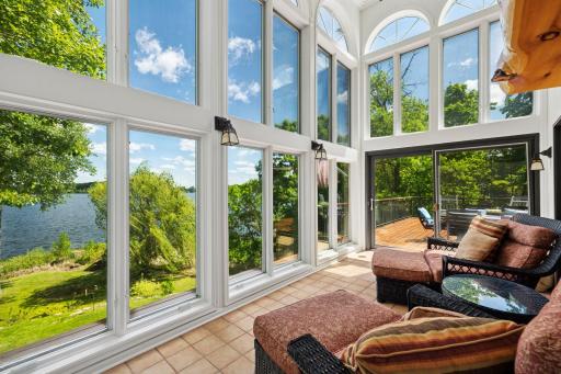 A unique design feature is the see-through walls of glass serving up constant and dramatic vistas to the interior rooms. One of the sellersâ favorite spaces is the 2-story, full-windowed sunroom.