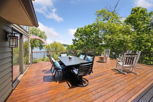 Generally, at this price-point, lots are narrower; decks, if built at all, are lakeside, which screens shoreline viewing. With scads of flexibility, this home embraces lake-style living in so many ways, one of which is a deck with multi-use scale