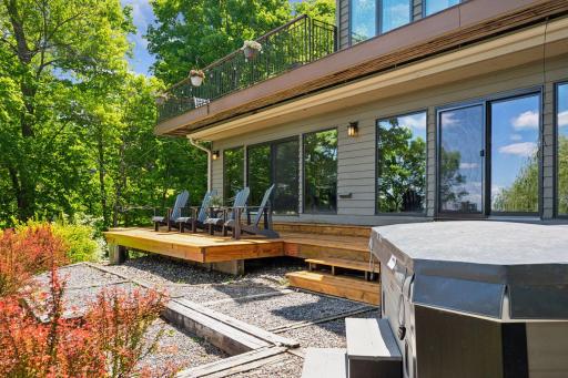 â¦ except that from here one can step into the hot tub that goes with the property. The nearly full-span lower deck has been freshly rebuilt.