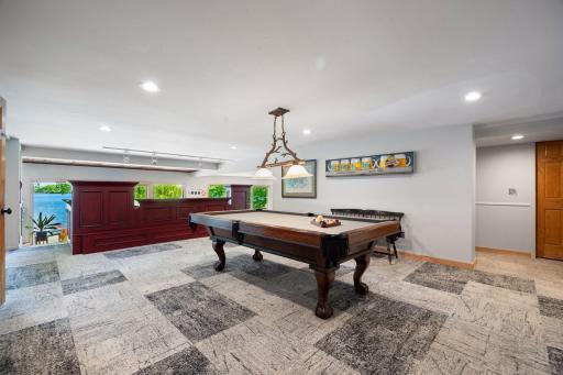 This is what one sees upon first steps into the lower level. The game space is generous; the entertainment space even larger---but then, always the captivating perspective.