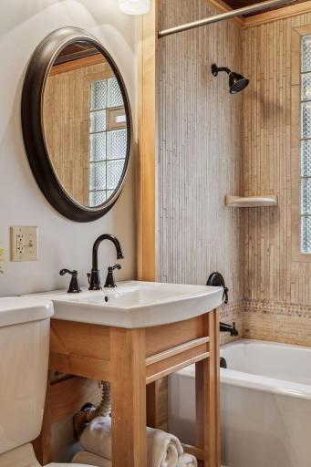 Main floor full bathroom features stunning tile!