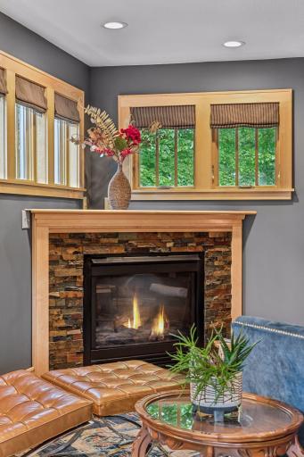 Great transom windows surround this beautifully appointed gas fireplace.