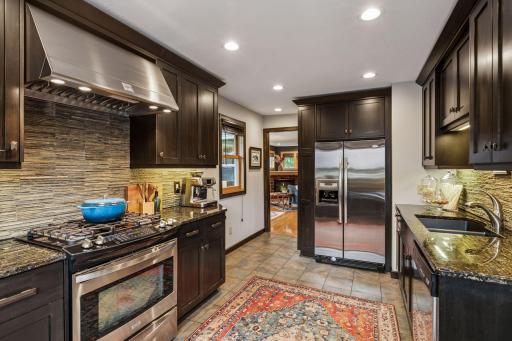 Check out this fantastic gas range and vent hood! Ready to start cooking?
