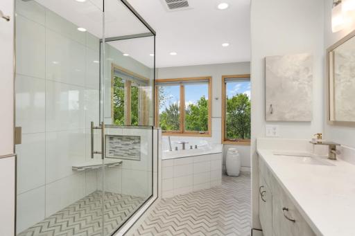 A full primary bathroom remodel was completed in 2024 and features a jetted tub and waterfall shower