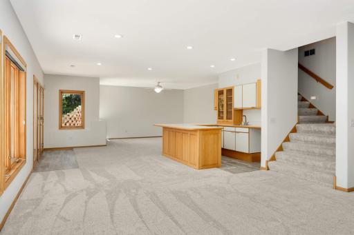 The lower level wet bar makes this a perfect entertaining space