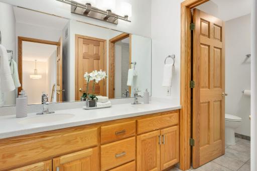 Upper level bathroom with a double vanity