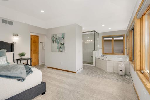 Enjoy the spa-like amenities of the ensuite primary bathroom