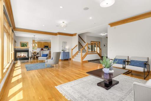 Oak hardwood floors and crown molding lighting bring a quiet elegance to the Great Room