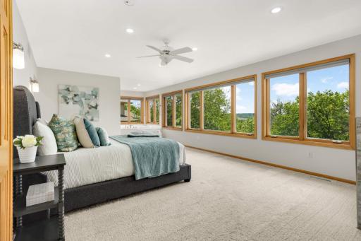 Relax in your primary suite with expansive views over the Minnesota River Valley