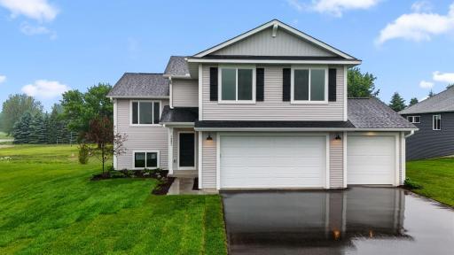 Exterior From Street - 3-Car Garage, Fully Landscaped, Sod & Irrigation