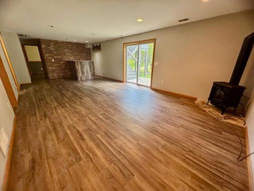 Family room has a slider door walk out to the backyard