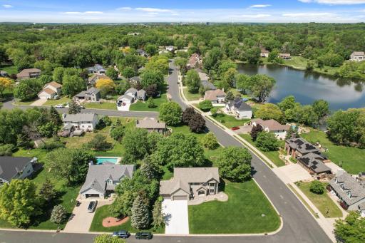 Aerial view of the home which is on a big corner lot.