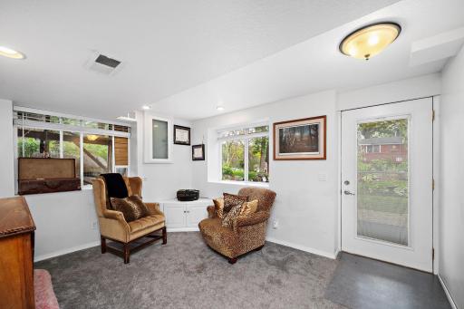 Perfect room as an office or sitting area with direct access to backyard patio