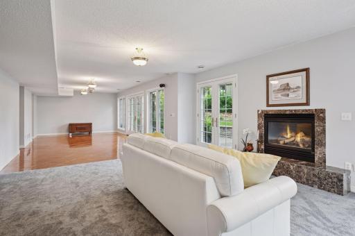 The walk-out lower level goes directly to the several backyard patios.
