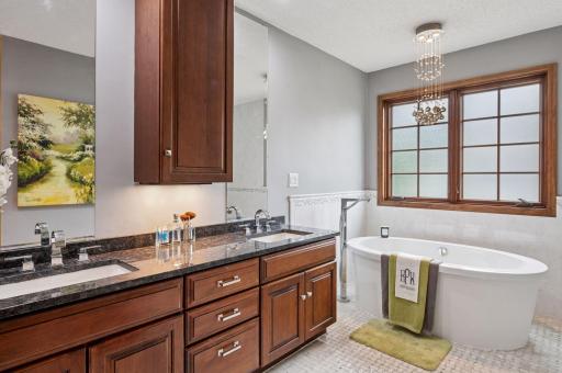 Primary bath is your sanctuary! Dual vanity and soaking tub!