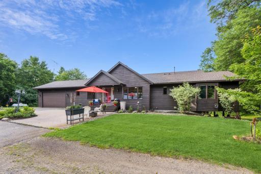 You are welcomed by a gorgeous aggregate patio area and charming front porch! The attached 2 car garage is heated too!