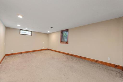 Lower-level family room with Egress window if one would like to add another bedroom