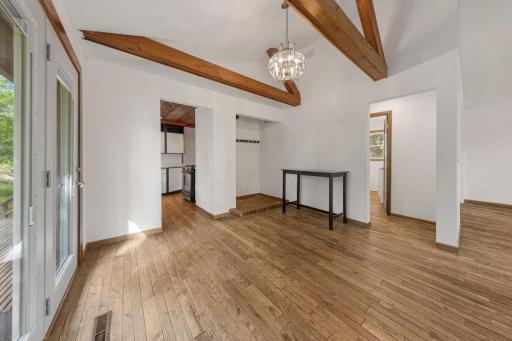 Vaulted Dining/Living Room with beautiful hardwood floors