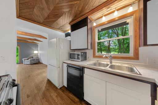 Kitchen with hardwood floors, and a hardwood ceiling!!