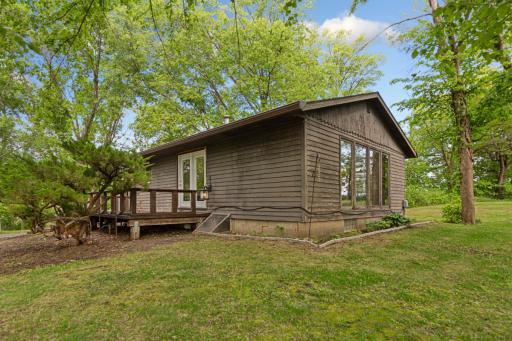Large side deck and a larger covered deck that overlooks the lake that is just awaiting some finishing touches.