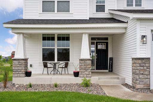 One of the first things you'll notice is the expansive covered front porch, a perfect spot to relax and unwind.