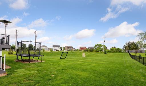 The expansive yard is perfect for hosting get togethers and has endless possibilities for all your outdoor plans and ideas.