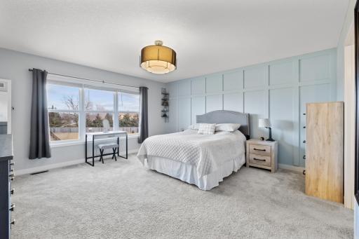 Welcome to the epitome of luxury and comfort in this upper-level primary suite with dual walk-in closets and a private 3/4 bath.