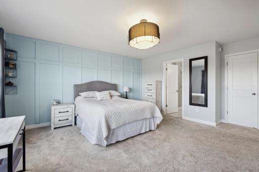 Natural light and plenty of room for king-sized furniture creating a serene oasis, perfect for rest and relaxation.