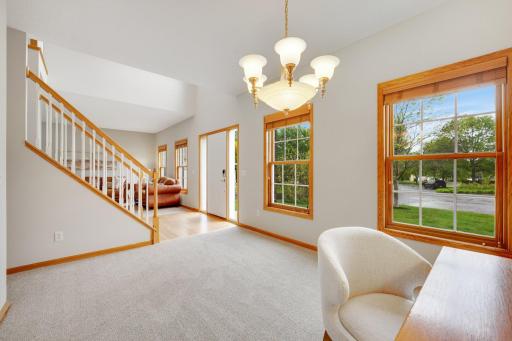 Bright and sunny home with new carpet, paint and re-finished hardwood floors