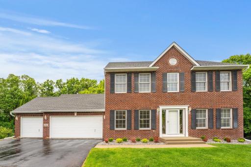 A stunning brick facade on this 2 story home situated on a cul-de-sac lot