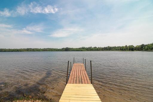 State owned property across the lake adds to the quiet serenity of this location! The public access is in a bay to the right...close by and conveniet.