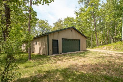 32x60 garage built in 2012 is divided into garage area, shop area, and rec/bunk area. See upcoming photos.