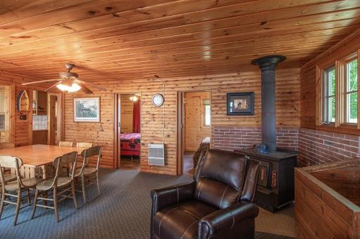 View of bedrooms and dining area from living area.