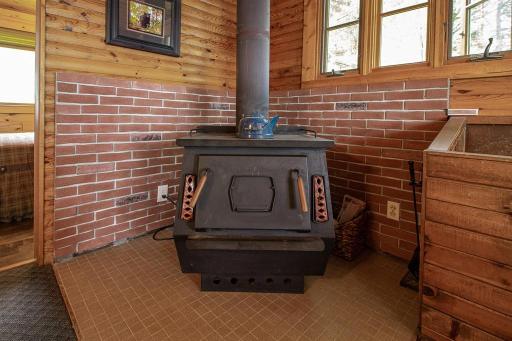 Woodstove keeps the chill at bay and is a main source of heat during colder months.