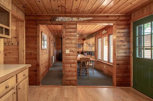 View from kitchen into dining area and living area beyond.