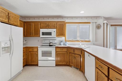 Spacious kitchen with ample storage and countertops.