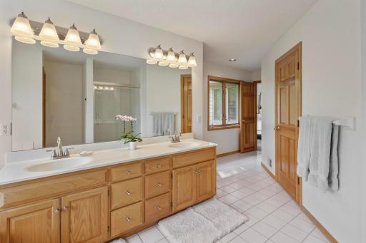 Double Bowl Vanity, Walk-In Closet and Linen Closet Complete the Ensuite