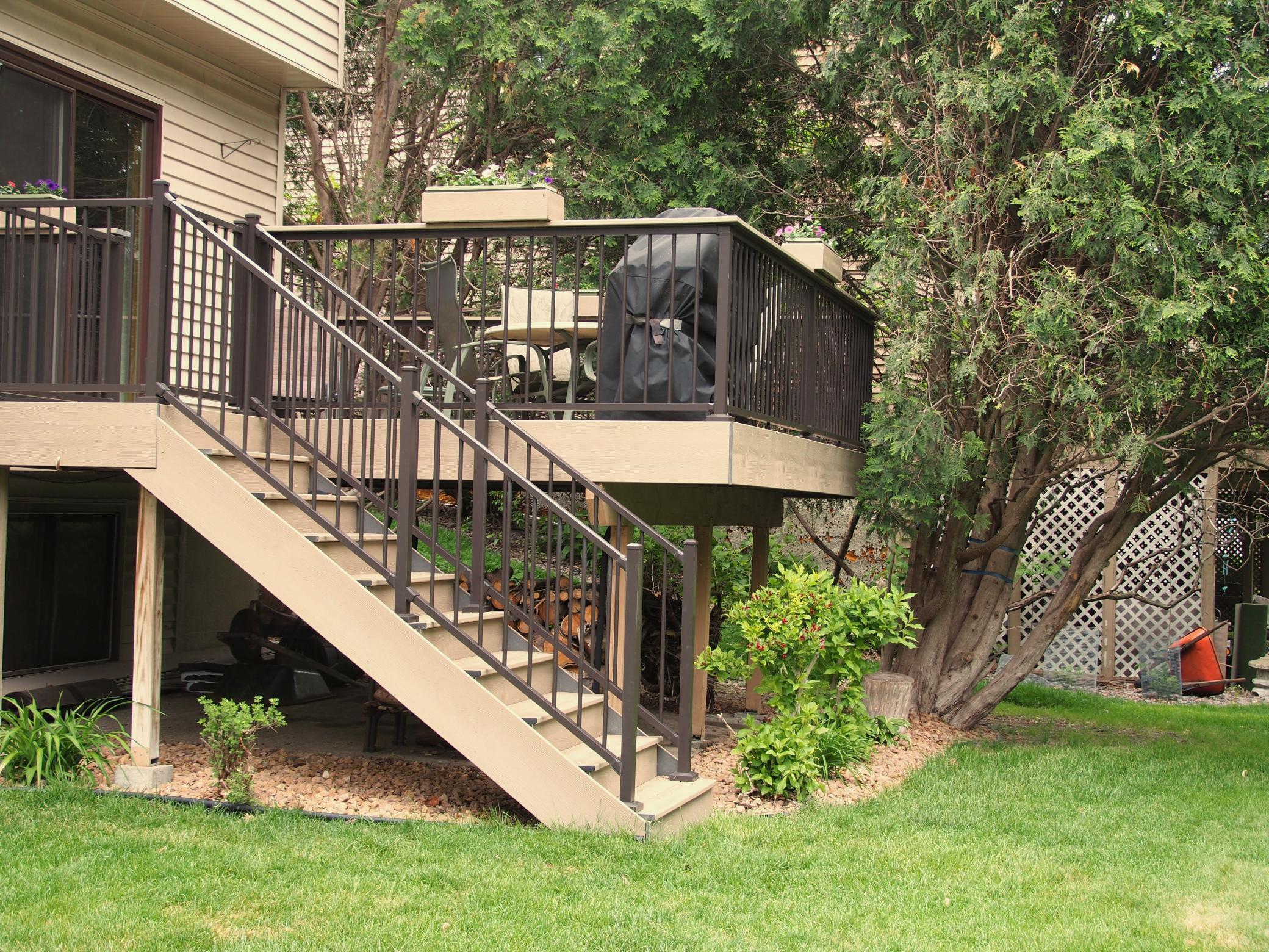 Deck stairs provide easy access to back yard
