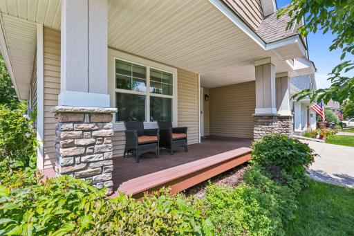 Charming & inviting front porch.