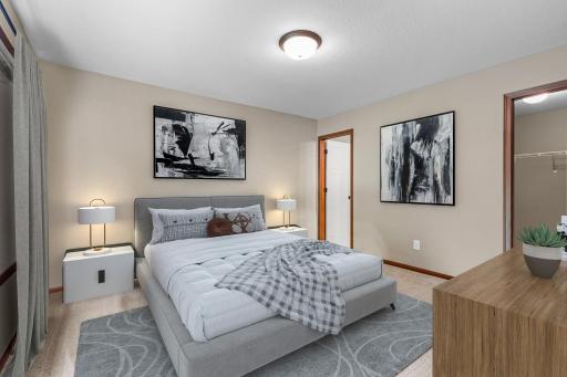 Primary suite with a private 3/4 bath & walk in closet- virtually staged