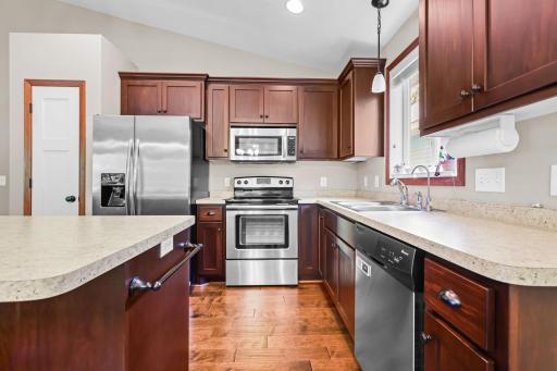 Sharp kitchen with pantry, ample counter space and storage, perfect for cooking and entertaining.