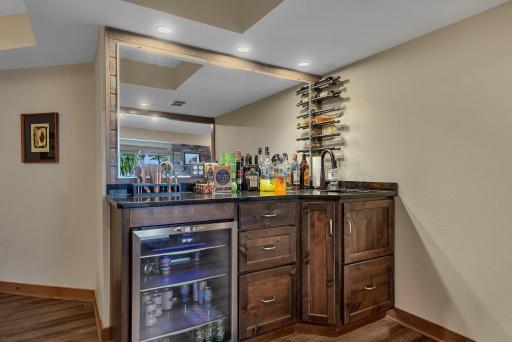 Enjoy the spacious lower level complete with a built-in wet bar, ideal for hosting or creating your own home retreat.