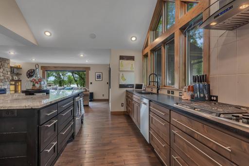 You will love cooking in a kitchen outfitted with a double oven and chefâs gas cooktopâideal for culinary enthusiasts.