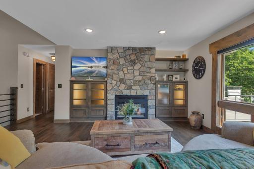 Fireplace warmth meets lakeside serenity.