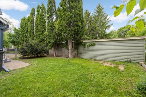 Back yard is mostly fenced in.