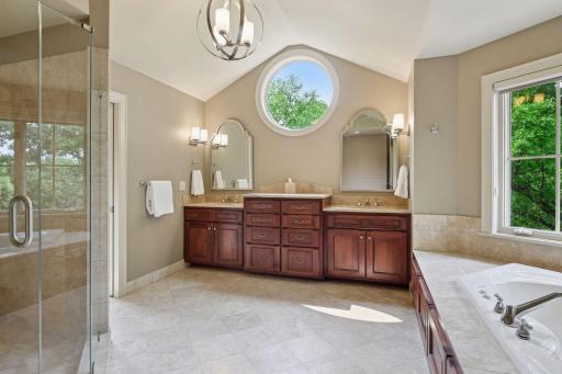 Large bath with 2 walk in closets, and large shower