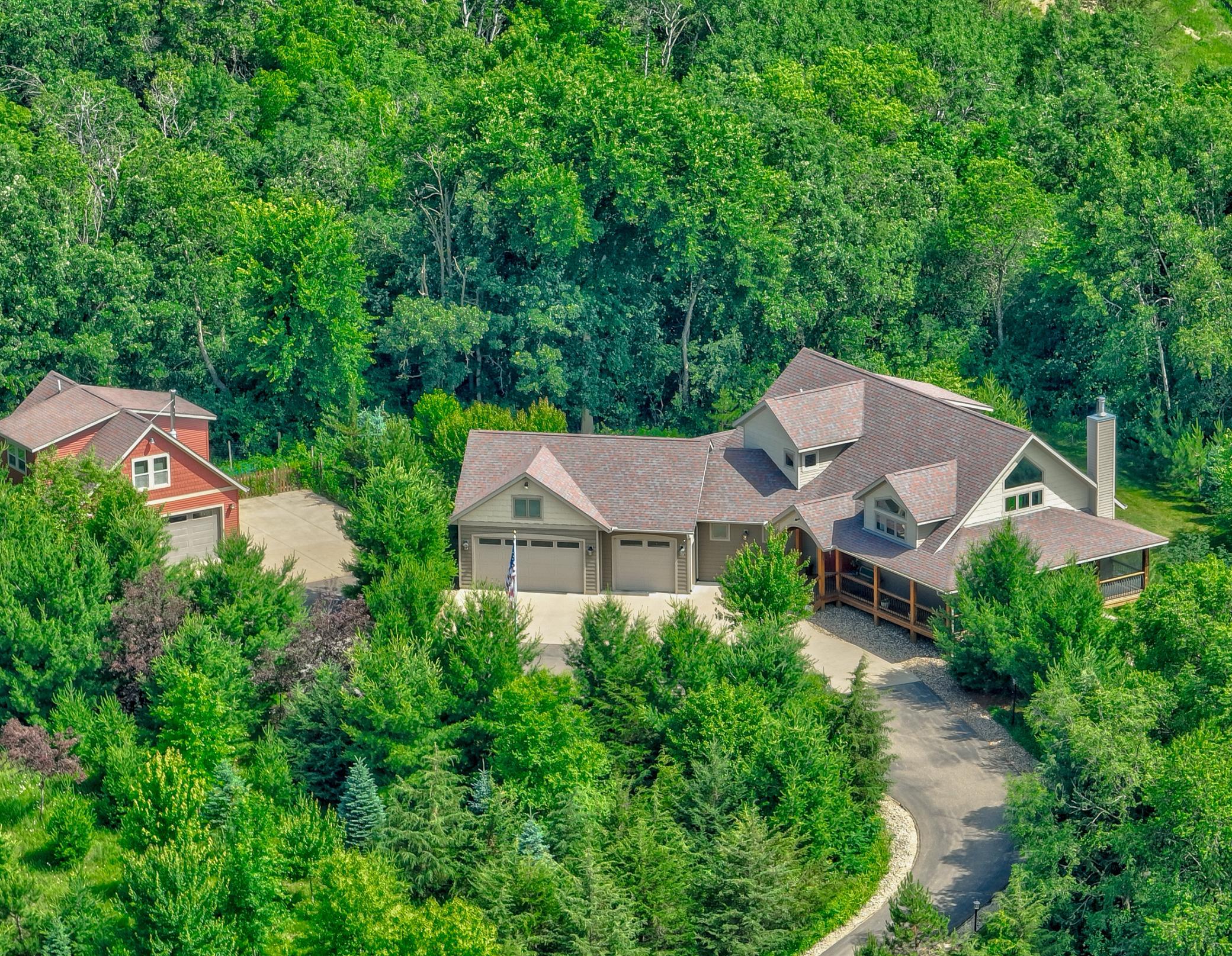 Surrounded by mature trees, cherry bushes, and maintained gardens, the beautifully landscaped lot is a private escape to enjoy the outdoors.