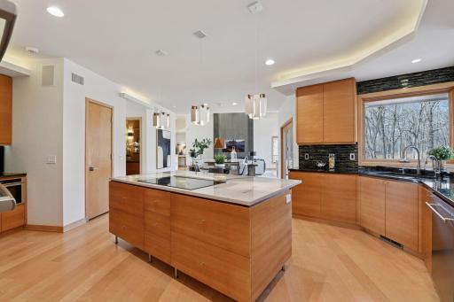 Enjoy the beatufiul flow from the kitchen to adjacent living spaces